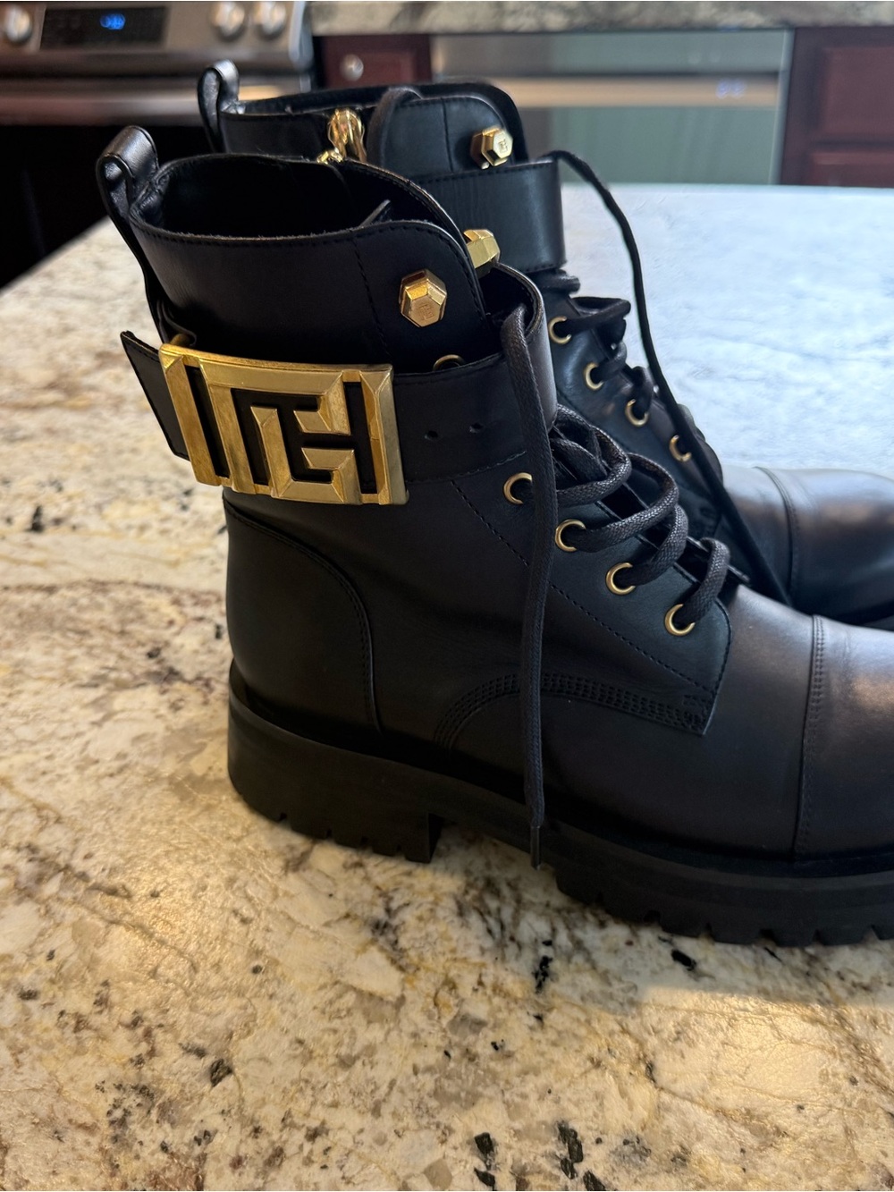 Balmain Black Leather Combat Boots with Gold Buckle
